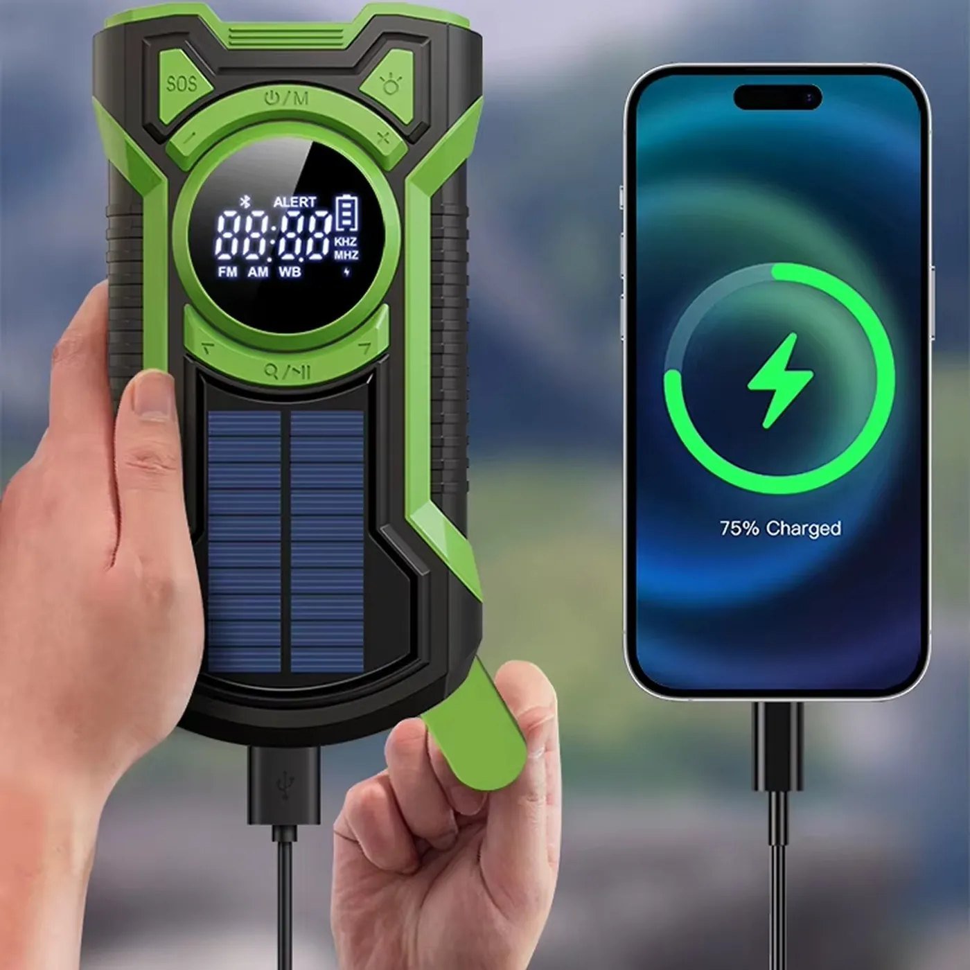 Hand holding the radio beside a phone it is charging